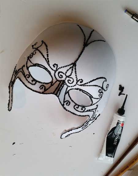 Using Marabu Relief Paste to add texture and decoration to the masks surface 